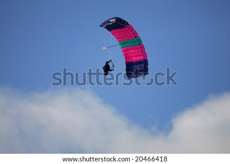 Sky Diver gliding down after Jumping from Airplane