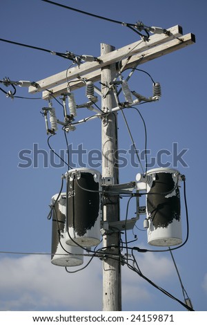 Weathered Transformers on a Utility Pole