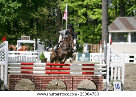 SARATOGA SPRINGS - May 10: Unidentified Rider Competes in the Open Division of the St. Clement\'s Horse Show on May 10, 2008 in Saratoga Springs, NY.