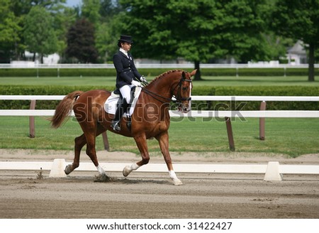 SARATOGA SPRINGS - MAY 23: Stephanie Nowak competes on Coriall the Junior Division at the Dressage May 23, 2009 in Saratoga Springs, NY.