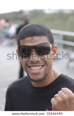 ATLANTIC CITY - JUNE 25: Juan Manuel Lopez current WBO super bantamweight posses for a photographer after a promotional event on the Boardwalk at Bally\'s Casino - June 25, 2009 in Atlantic City, NJ