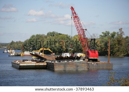 FORT EDWARD, NY- SEPT 26: Dredging equipment line the river above Ft. Edward during PCB cleanup in the Hudson River, SEPT 26, 2009 in Fort Edward, NY.