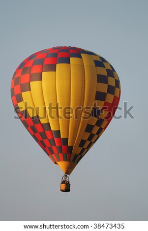 Beautiful Balloon rising in the blue sky