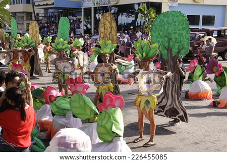 DUMAGUETE CITY- OCT. 25: Participants of the Buglasan Festival, Philippine cultural tradition of street dancing and merry making on Oct. 25, 2014 in Dumaguete City, Negros Oriental, Philippines.