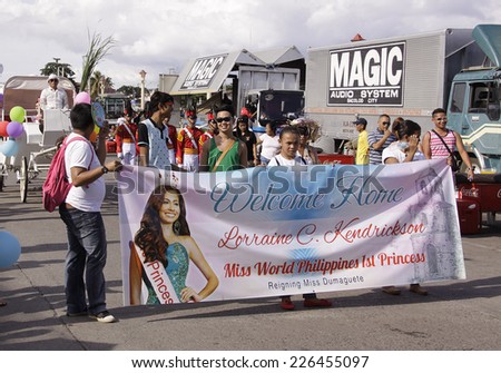 DUMAGUETE CITY- OCT. 25: Participants of the Buglasan Festival, Philippine cultural tradition of street dancing and merry making on Oct. 25, 2014 in Dumaguete City, Negros Oriental, Philippines.