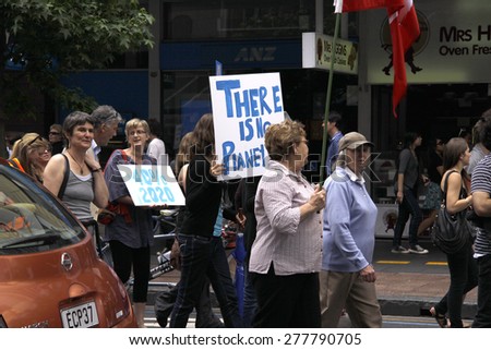 AUCKLAND- DEC. 5: Green Peace Climate Change campaigners engage in a protest march in Auckland, New Zealand on December 5, 2009.