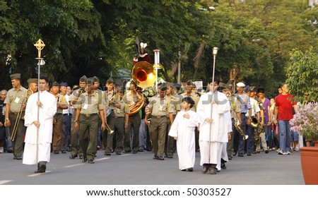MANILA - APRIL 2: Catholic devotees participate in  solemn procession on Good Friday, April 2, 2010 in Metro Manila, Philippines