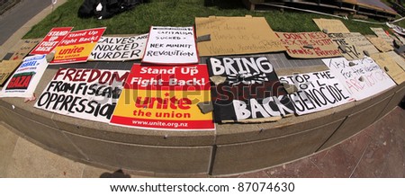 AUCKLAND- OCT. 21: Occupy Wall Street demonstration protest signs banners set up at the Aotea Square in Auckland, New Zealand on Friday October 21, 2011.