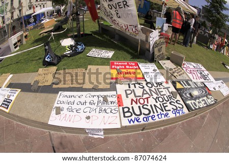 AUCKLAND- OCT. 21: Occupy Wall Street demonstration protest signs banners set up at the Aotea Square in Auckland, New Zealand on Friday October 21, 2011.