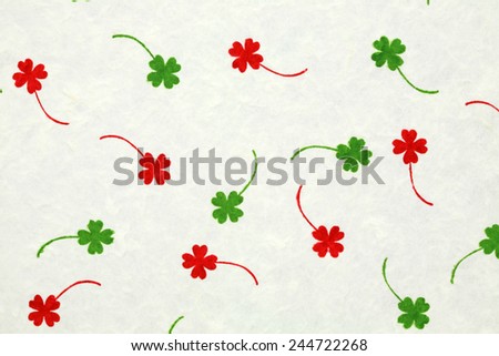 White mulberry paper with red  and green leafs for background