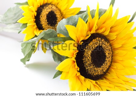 Artificial sunflower on white background