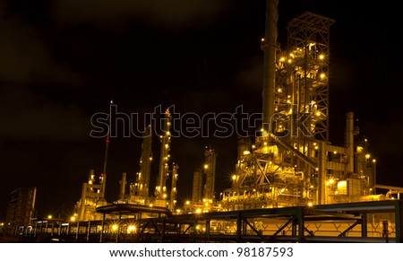 Oil refinery in full operation during the night, industrial estate, Thailand