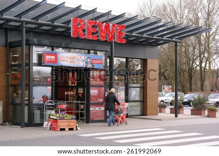MEPPEN, GERMANY - FEBRUARY 27: Entrance of a REWE supermarket, part of the REWE Group, a German retail and tourism group, operates in 14 European countries. Taken in Meppen, Germany, February 27, 2014
