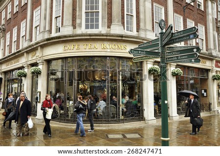 YORK, UNITED KINGDOM - APRIL 19TH:  Rainy day in York, England. The famous Betty\'s Tea Rooms at Helenas Square, York, North Yorkshire, United Kingdom on April 19, 2010
