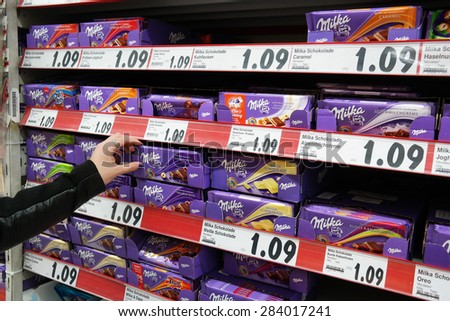 MEPPEN, GERMANY - FEBRUARY 27: Shelves with a variety of Milka chocolate bars in a Kaufland supermarket. Milka is a Swiss brand of chocolate confection. Taken on February 27, 2015 in Meppen Germany