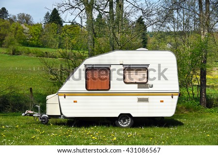 Old-fashioned 1980s caravan on a camping site in Belgium.