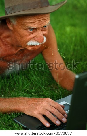 Old man with computer has a problem