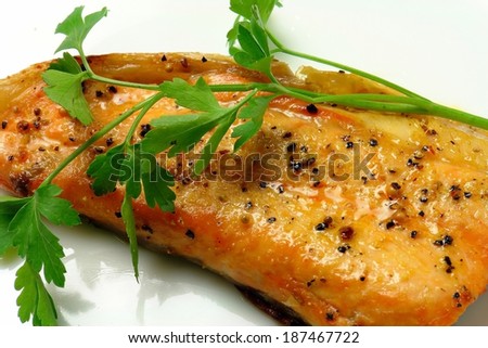 fried fish and shrimp in sunflower oil, white background. art of cooking,