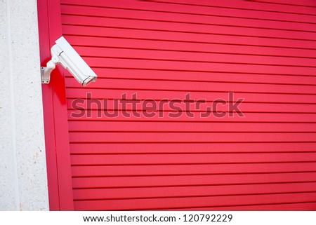 Security camera monitors access to industrial premises