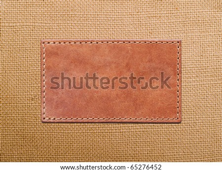 blank leather label stitched onto the canvas