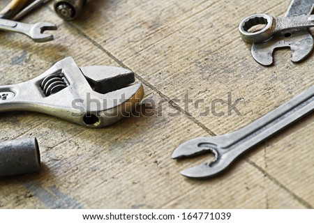 Adjustable wrench and tools for bike repairing