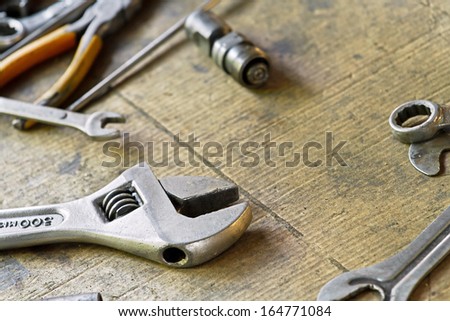 Adjustable wrench and tools for bike repairing