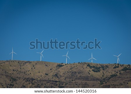 Wind turbines along a ridge line in the Columbia River Gorge