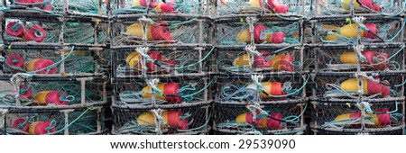 Stack of crab traps in panoramic format.
