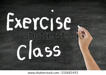 hand writing word Exercise class with chalk on blackboard