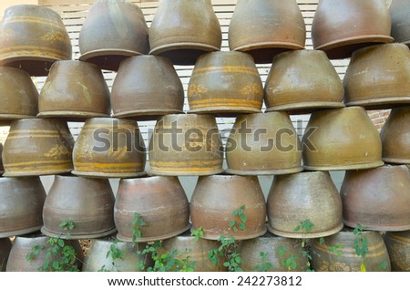 stack of aged clay jars