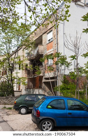 MOSTAR, BOSNIA AND HERZEGOVINA - April 16, 2014 - Destroyed house in Mostar - Bosnia and Herzegovina.