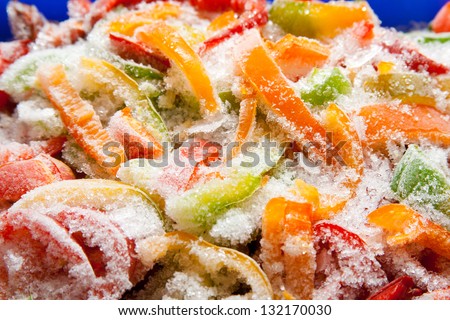Assortment of frozen vegetables and peppers, closeup