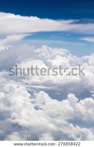 Top view with white fluffy clouds from above, bird eye view