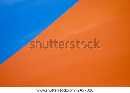 Side of an old van painted bright orange and blue made a nice abstract.