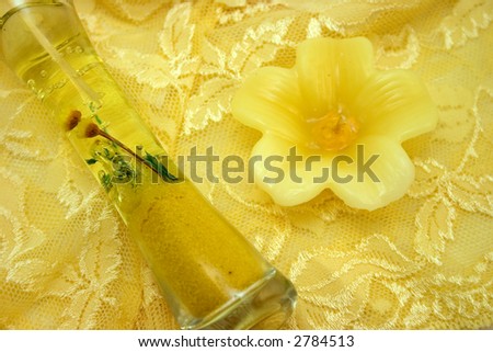 Yellow lace and candles depict happy femininity and warm sunny weather.