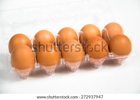 A carton of fresh free range egg on a white background.