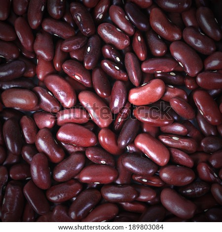 Red kidney bean texture background. Also called Rajma or Mexican Bean. A large, kidney-shaped bean with a subtle sweet flavor and soft texture that keep their shape during cooking.