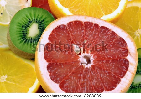 scene slice kiwi ,lemon,orange on white background