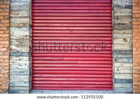 Red Metal Garage Rolled Up Door