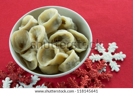 Polish traditional mushroom dumplings. Usually served with red borscht (czerwony barszcz) during Christmas Eve dinner / supper.