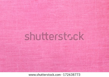 Empty pink linen fabric background. Natural linen surface. Plenty of copy space.