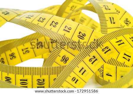 Yellow tape measure isolated on white background. Weight loose problem.
