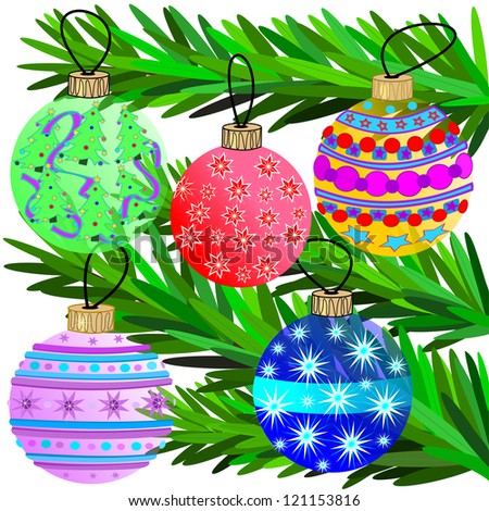 Christmas Ornaments.  Colorful Christmas ornaments with pine tree branches in the background.