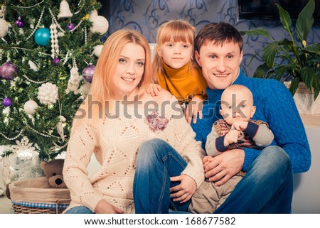 Christmas time indoor family portrait