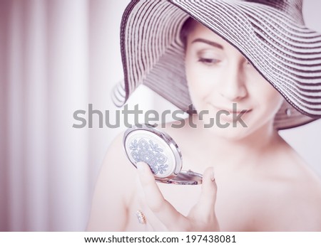 woman with mirror