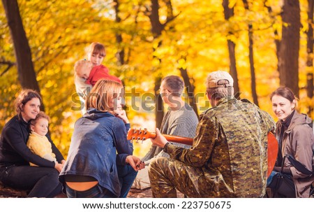 big company at fall season forest picnic