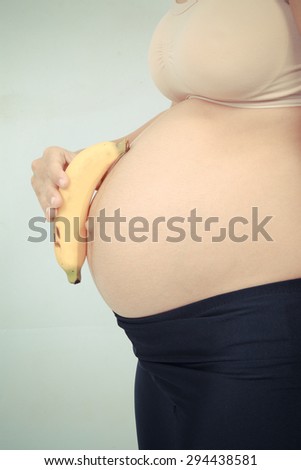 pregnant woman and bananas vintage color