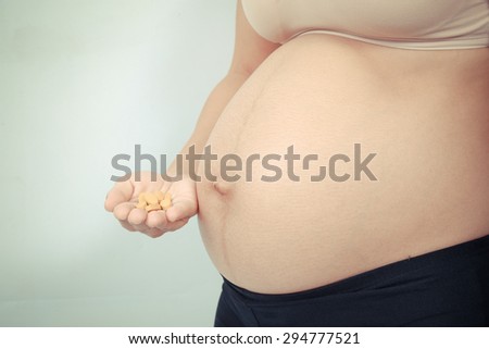 pregnant woman and  medicine vintage color