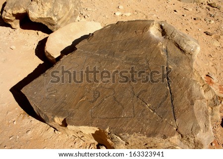 Ancient Text and Drawings Carved into Rock, Wadi Rum, Jordan