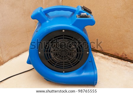 Industrial fan to remove water damage.